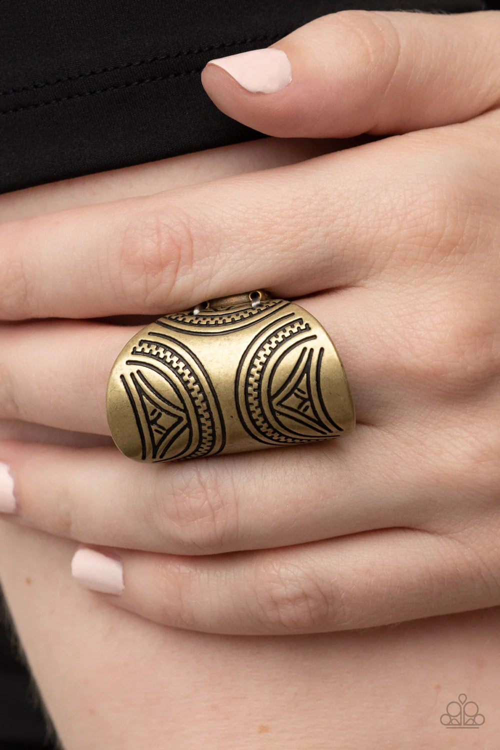 Paparazzi Accessories Pharaoh Party - Brass Stamped in triangular tribal inspired motifs, a brass oval frame curls around the finger for a rustic flair. Features a stretchy band for a flexible fit. Sold as one individual ring. Jewelry