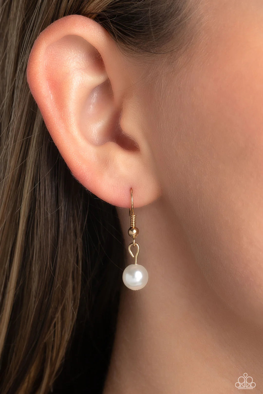 Paparazzi Accessories Upper Class - Gold Attached to a section of dainty gold links, white rhinestones, pressed into shiny gold box chain fittings swing down the neckline in a lariat-like manner for an effulgent glow. Sporadically infused along the box ch
