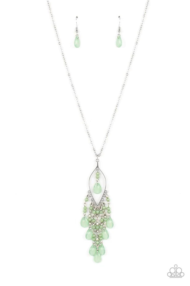 Paparazzi Accessories Sweet DREAMCATCHER - Green Dainty spearmint pearls, silver accents, and spearmint teardrop beads in an opaque finish cascade from the bottom of an airy silver almond-shaped frame. A strand of spearmint pearls and a solitaire spearmin