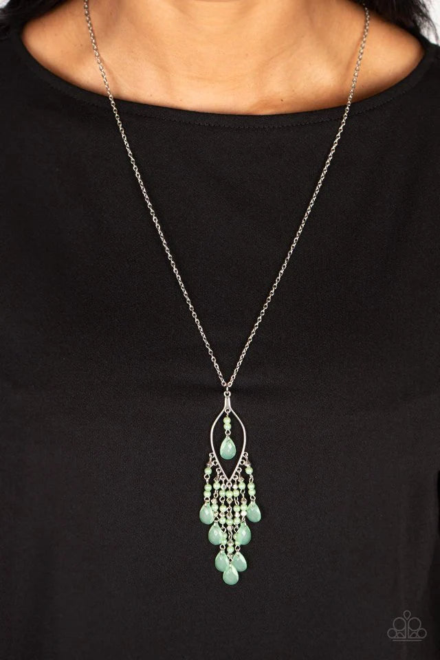 Paparazzi Accessories Sweet DREAMCATCHER - Green Dainty spearmint pearls, silver accents, and spearmint teardrop beads in an opaque finish cascade from the bottom of an airy silver almond-shaped frame. A strand of spearmint pearls and a solitaire spearmin