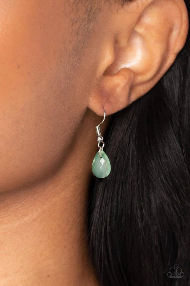 Paparazzi Accessories Sweet DREAMCATCHER - Green Dainty spearmint pearls, silver accents, and spearmint teardrop beads in an opaque finish cascade from the bottom of an airy silver almond-shaped frame. A strand of spearmint pearls and a solitaire spearmin