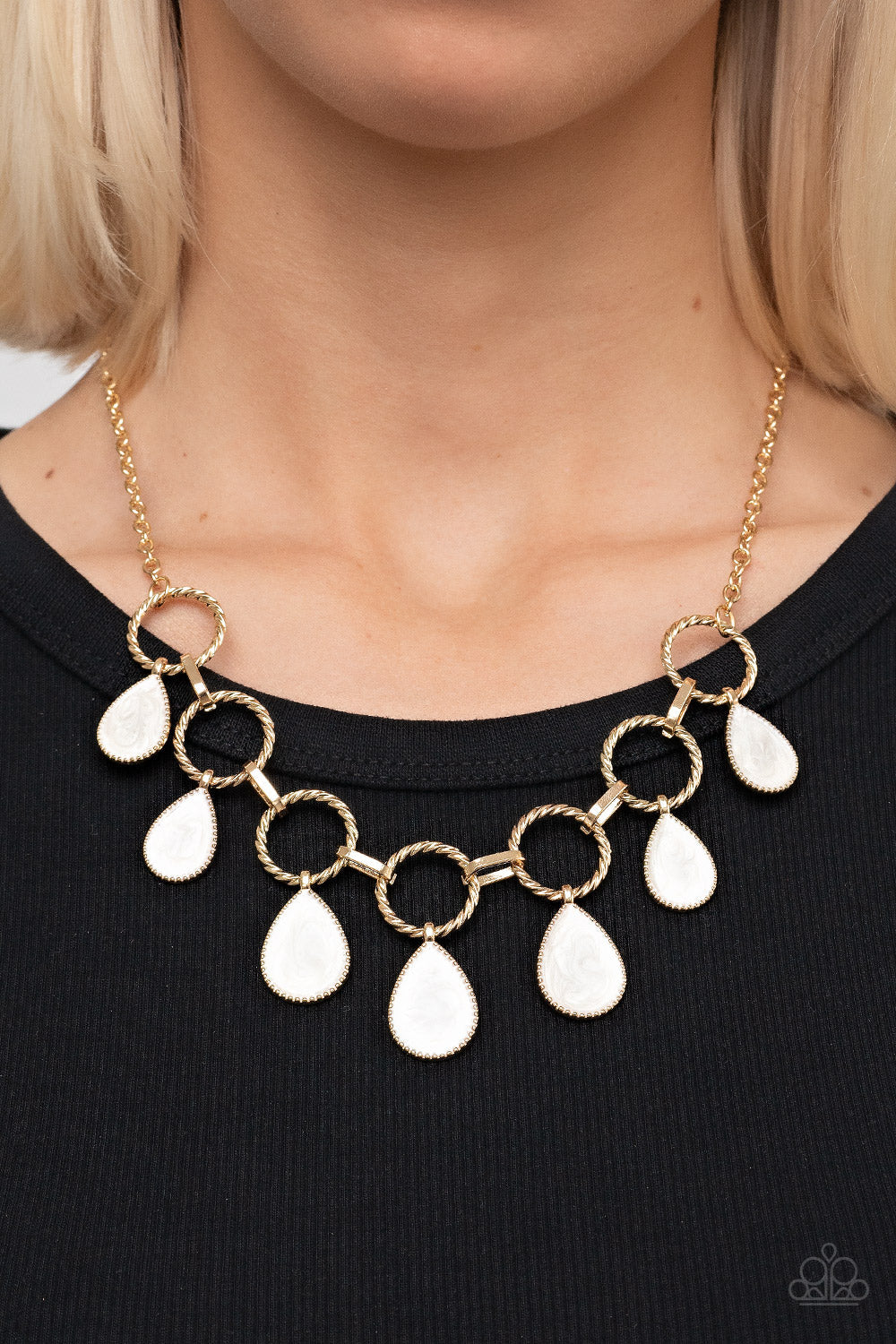 Paparazzi Accessories Golden Glimmer - Gold Swirling with white glazed finishes, textured gold teardrops swing from the bottoms of spun gold hoops that link with pinched gold fittings below the collar, resulting in a refined fringe below the collar. Featu