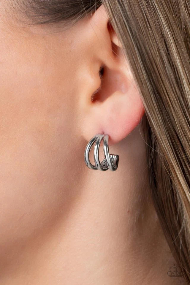 Paparazzi Accessories TRIPLE Down - Silver Three dainty silver frames curve into a single hoop, creating a layered peek of shimmer. Earring attaches to a standard post fitting. Hoop measures approximately 1/2" in diameter. Sold as one pair of hoop earring
