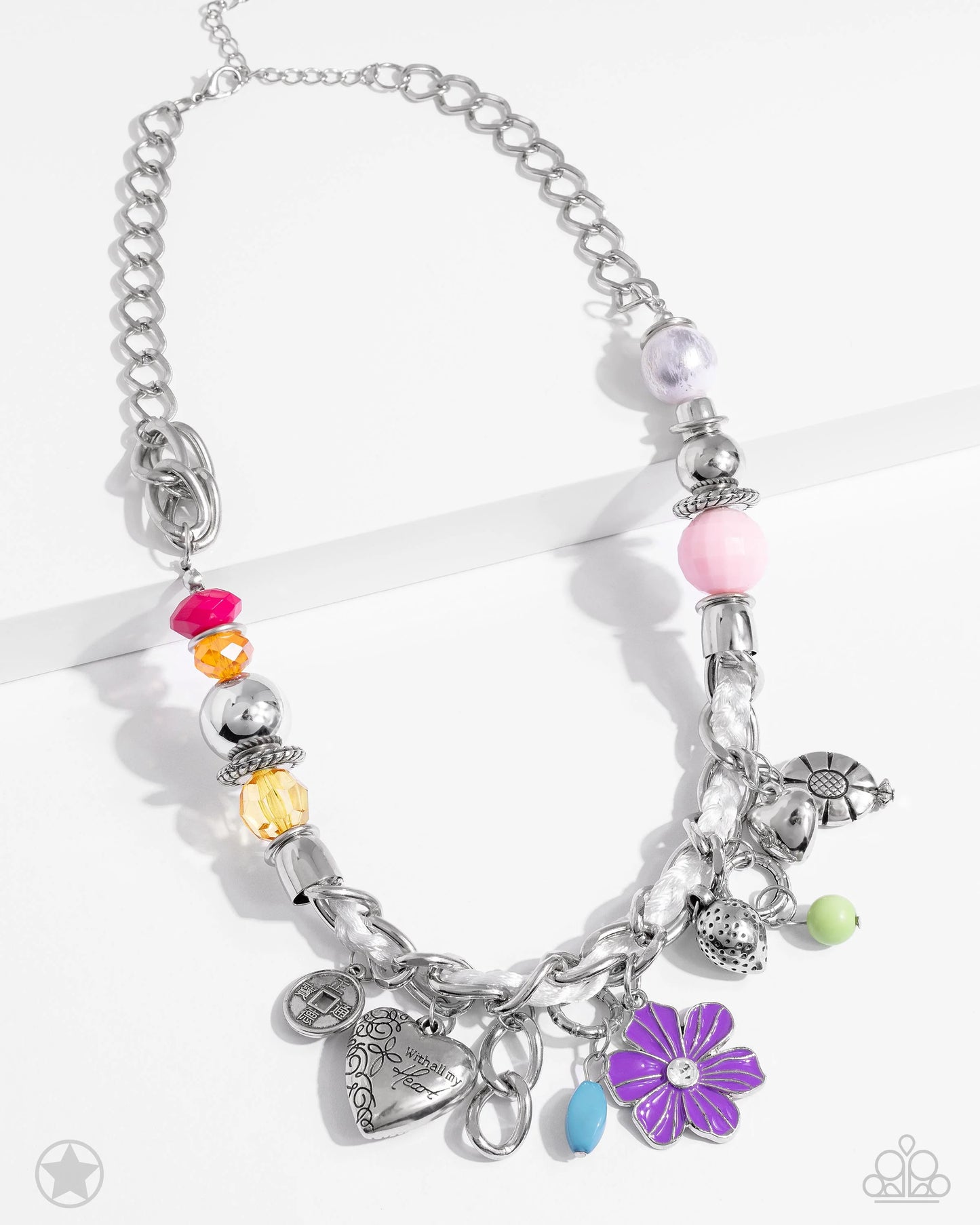 Paparazzi Accessories Charmed I Am Sure - Multi White cording is braided through a chunky silver chain. A unique variety of colorful charms decorate the piece including a delicate flower and a heart inscribed with the phrase "With All My Heart" on one sid