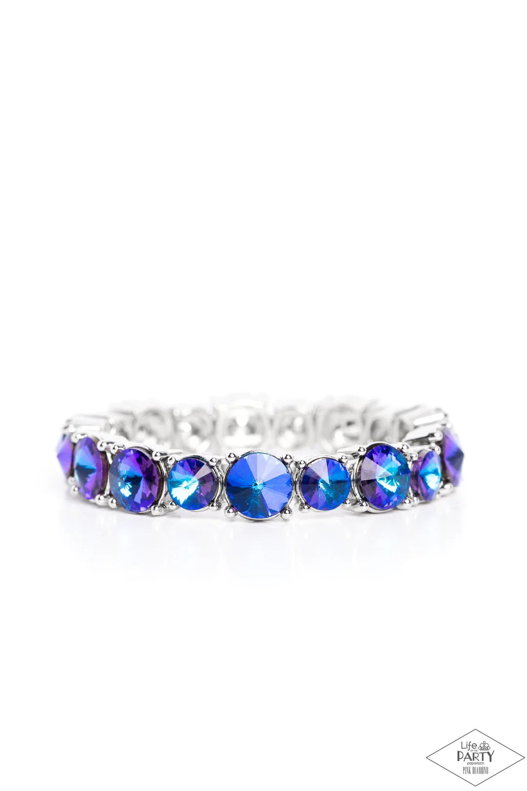 Paparazzi Accessories Born to Bedazzle - Blue An assortment of oversized blue oil spill rhinestones are pressed into silver frames and threaded along stretchy bands, creating a blinding sparkle around the wrist. Due to its prismatic palette, color may var