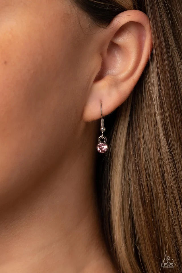 Paparazzi Accessories Can’t BUTTERFLY Me Love - Pink A silver butterfly, dotted in dainty light rose rhinestones, hangs from the bottom of a dainty silver chain. A smaller, airy silver butterfly appears to be in mid-flight as it's tilted to its side and b