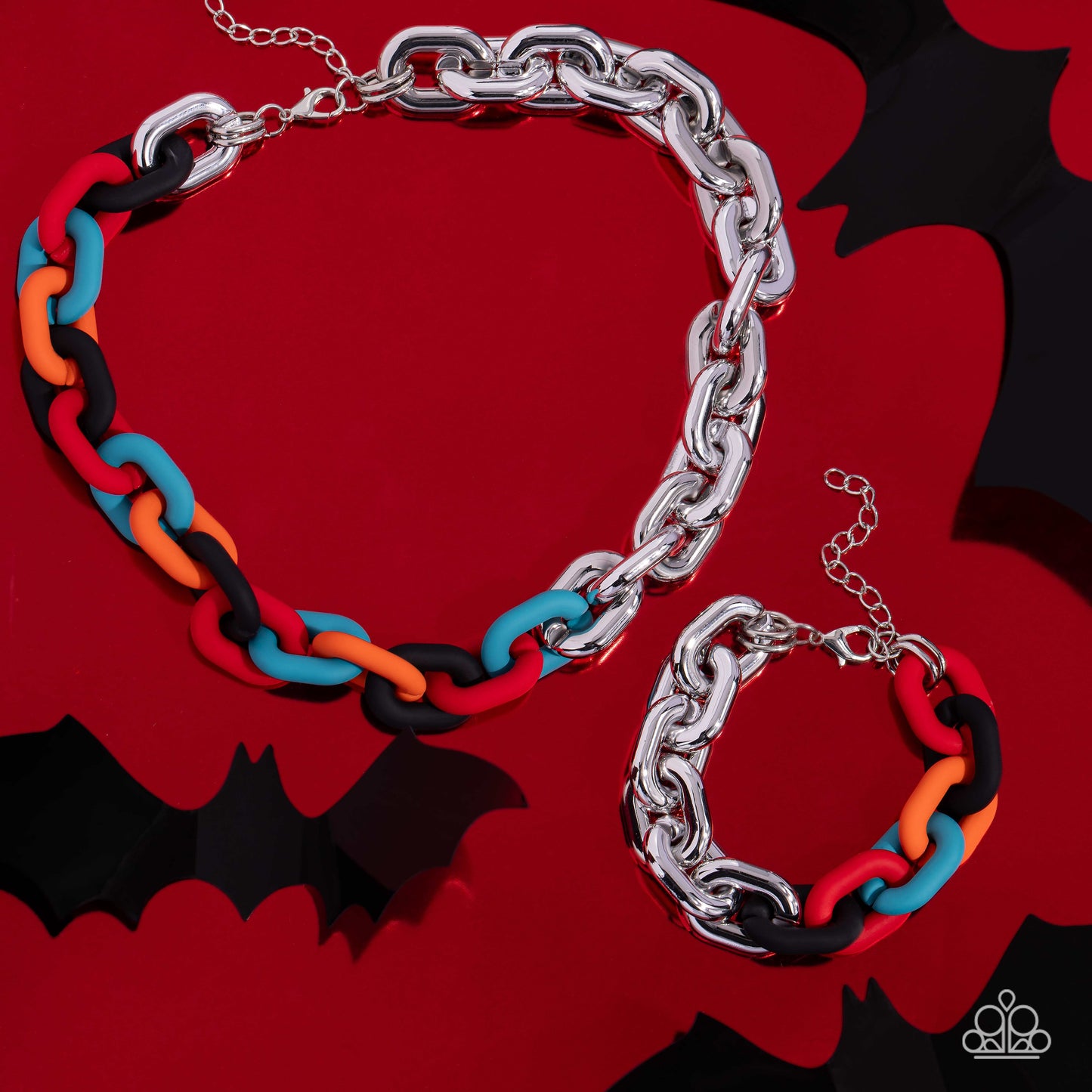 Paparazzi Accessories Contrasting Couture - Black A strand of oversized silver curb chain collides with black, red, turquoise, and orange acrylic curb links to create an abstract blend of grit and color. The oversized links of the colored curb chain offse