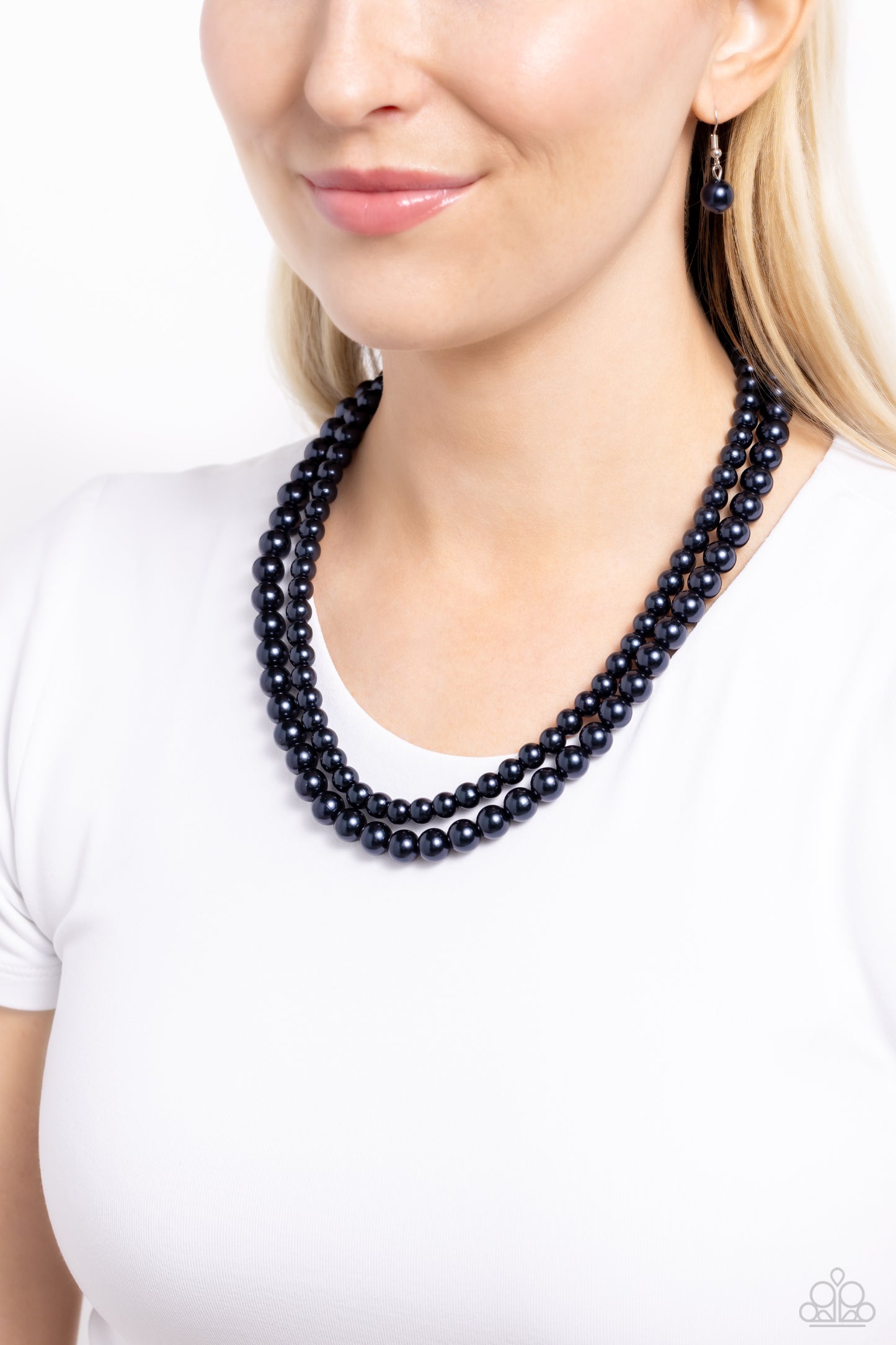 Paparazzi Accessories Woman Of The Century - Blue Two strands of classic blue pearls are strung along invisible wires below the collar. Each strand slightly varies in size, adding a modern twist to the timeless pearl palette. Features an adjustable clasp
