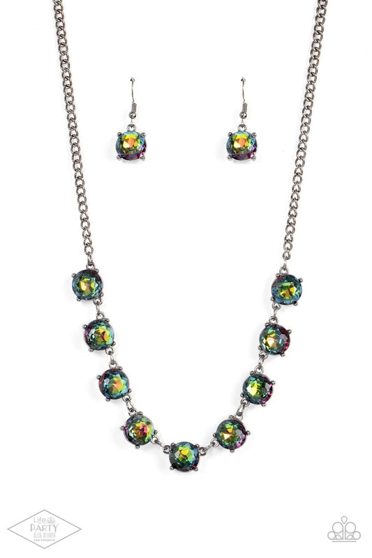 Paparazzi Accessories Iridescent Icing - Multi Featuring oil spill centers and sleek gunmetal fittings, a collection of oversized rhinestones link below the collar for an icy look. Features an adjustable clasp closure. Sold as one individual necklace. Inc