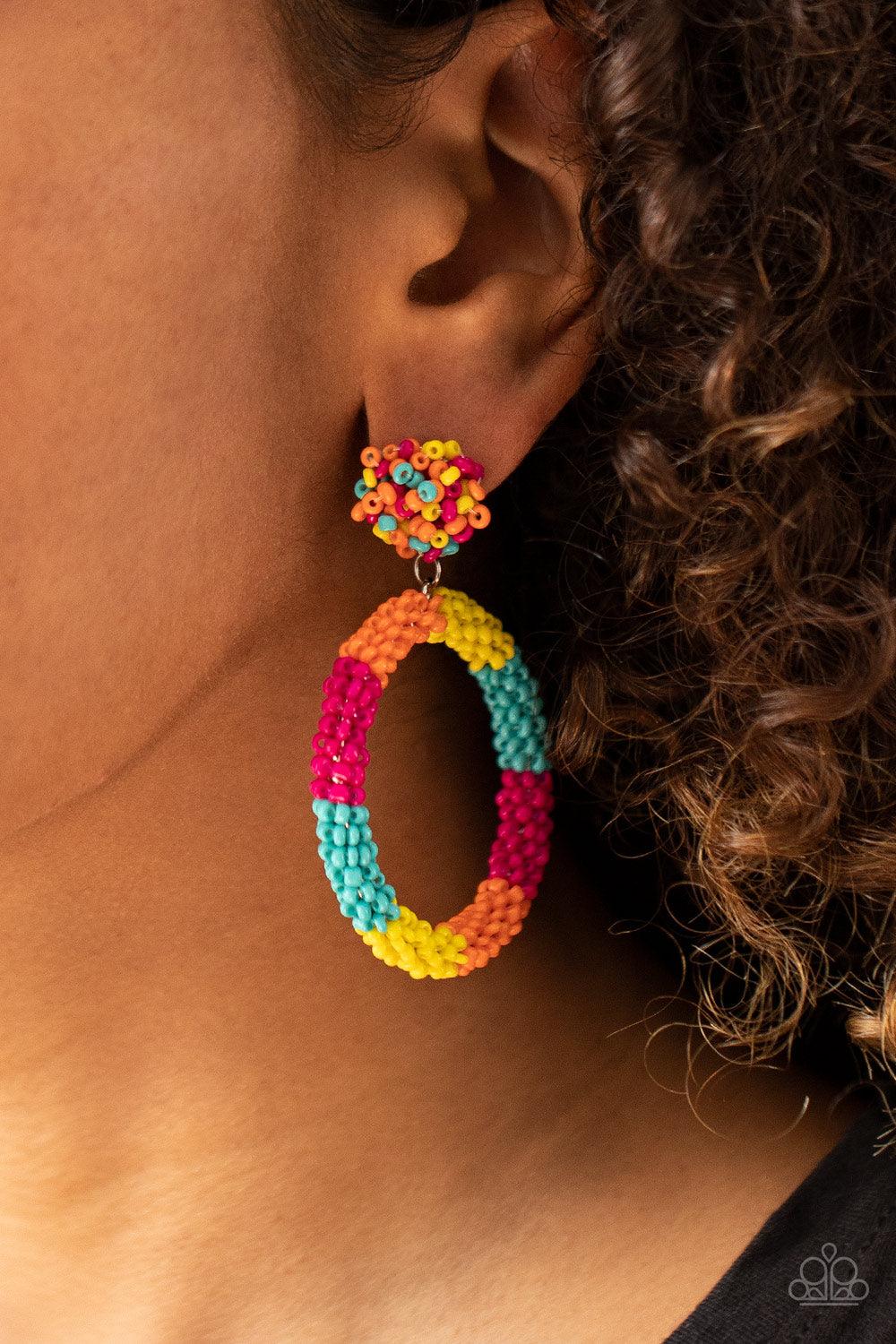 Paparazzi Accessories Be All You Can BEAD - Multi A vivacious collection of dainty yellow, turquoise, Amberglow, and Pink Peacock seed beads are woven around a circular frame at the bottom of a matching beaded fitting, creating a colorful hoop. Earring at