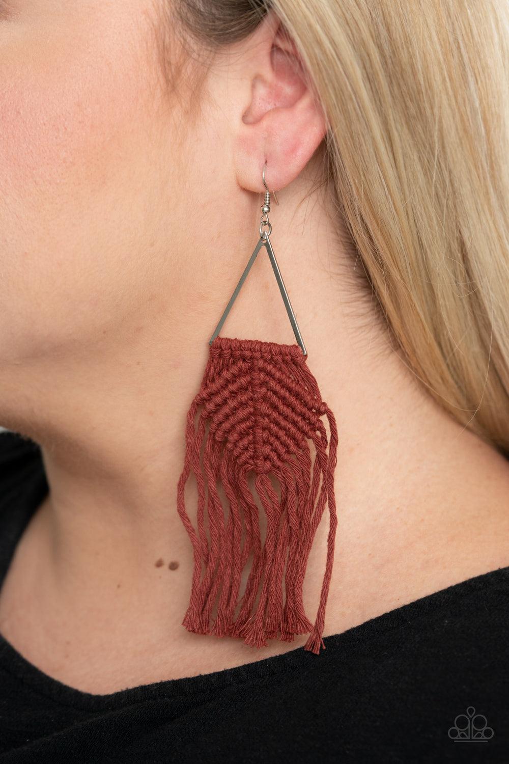 Paparazzi Accessories Macrame Jungle - Brown Fired Brick cording delicately knots and weaves around the bottom of an airy silver triangle, creating a colorful macramé inspired fringe. Earring attaches to a standard fishhook fitting. Sold as one pair of ea
