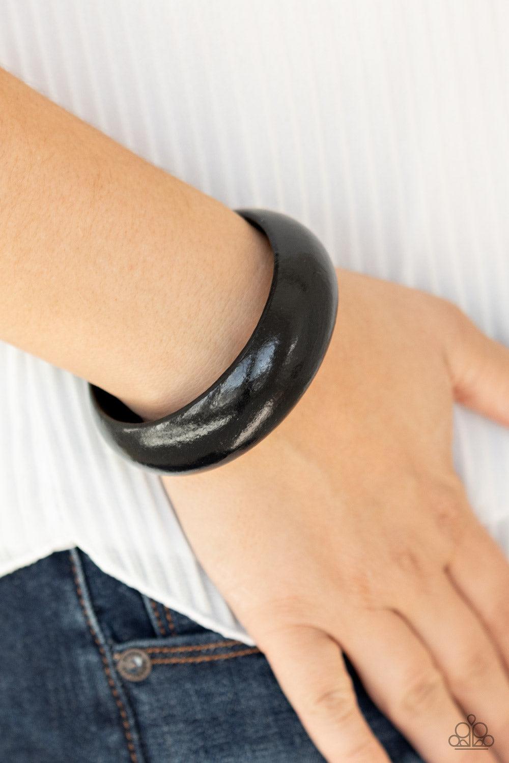 Paparazzi Accessories Whimsically Woodsy - Black Brushed in a neutral black finish, an oversized wooden bangle makes a boldly authentic impact. Sold as one individual bracelet. Jewelry