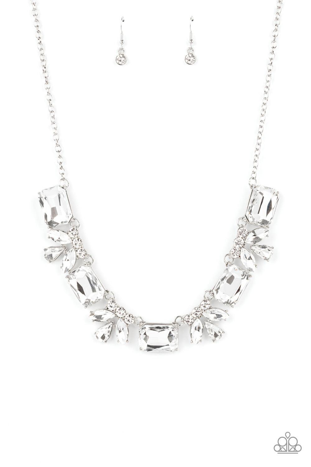 Paparazzi Accessories Long Live Sparkle - White An oversized collection of white emerald cut gems and regally cut clusters of rhinestones delicately link below the collar, creating a dramatically sparkly fringe. Features an adjustable clasp closure. Sold