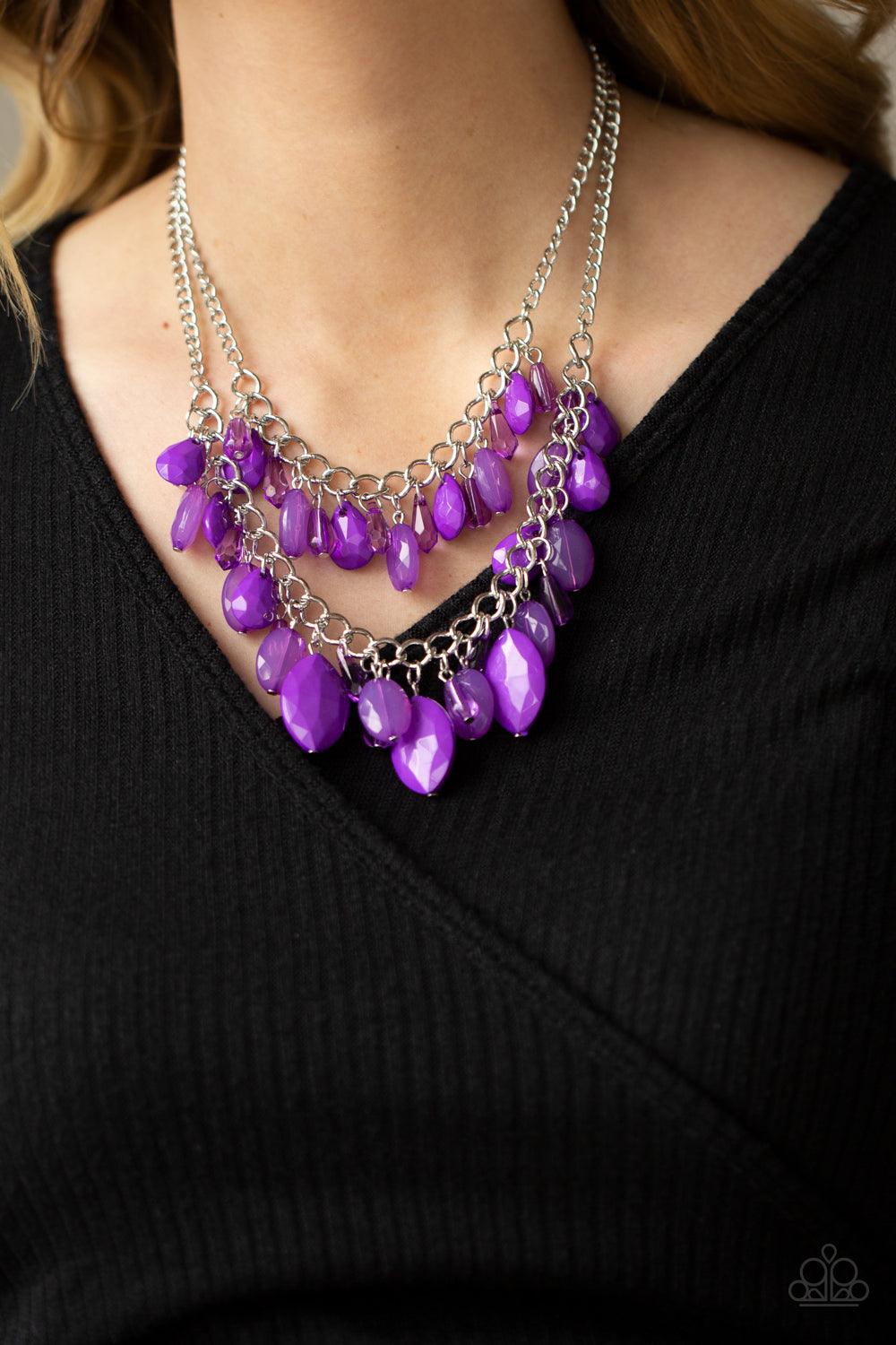 Paparazzi Accessories Midsummer Mixer - Purple Varying in opacity, a vivacious collection of purple oval and teardrop acrylic and crystal-like beads cascade from two bold silver chains below the collar for a flirtatiously layered look. Features an adjusta