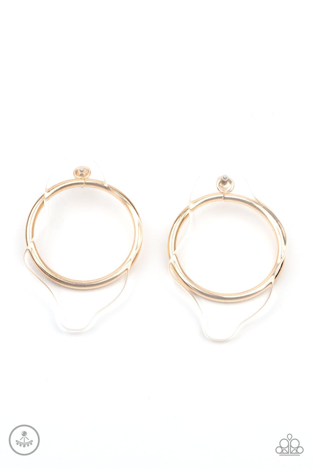 Paparazzi Accessories Clear The Way! - Gold An asymmetrical piece of clear acrylic overlaps a glistening gold hoop, creating a bold display. Earring attaches to a standard post fitting. Sold as one pair of post earrings. Jewelry