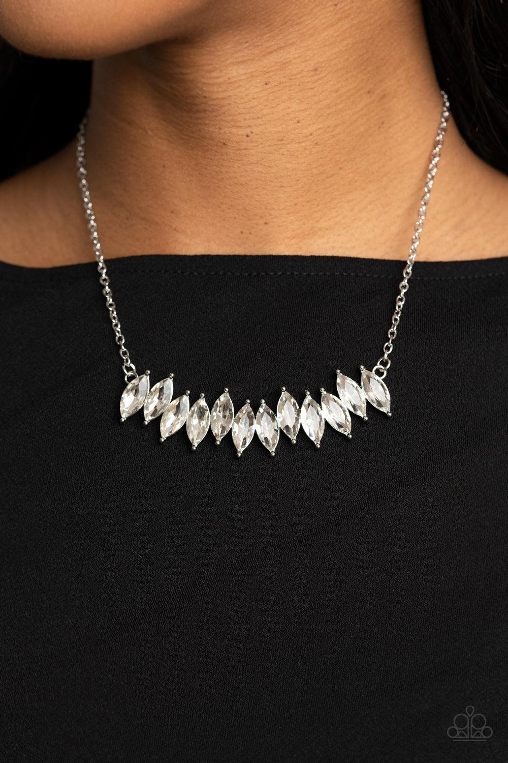 Paparazzi Accessories Icy Intensity - White A regal row of marquise cut white rhinestones stagger below the collar, coalescing into an icy pendant. Features an adjustable clasp closure. Sold as one individual necklace. Includes one pair of matching earrin