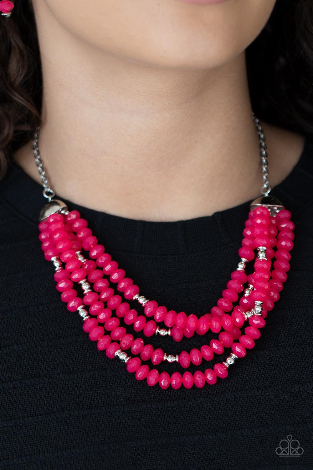 Paparazzi Accessories Best POSH-ible Taste - Pink Featuring bold silver fittings, a whimsical collection of faceted pink opaque crystal-like beads and dainty silver beads are threaded along invisible wires below the collar, creating vivacious layers. Feat