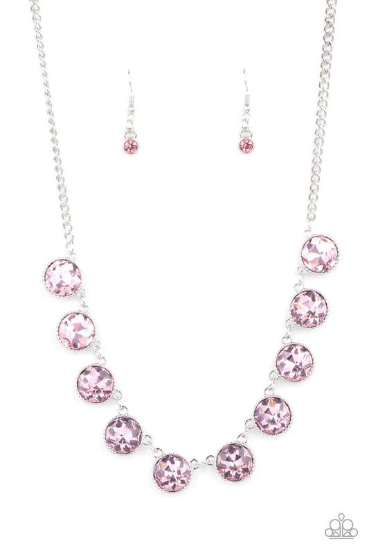 Paparazzi Accessories Mystical Majesty - Pink Featuring a mystical iridescence, a sparkling display of round cut pink gems are encased in delicately textured silver frames as they link below the collar, creating a majestic statement piece. Features an adj