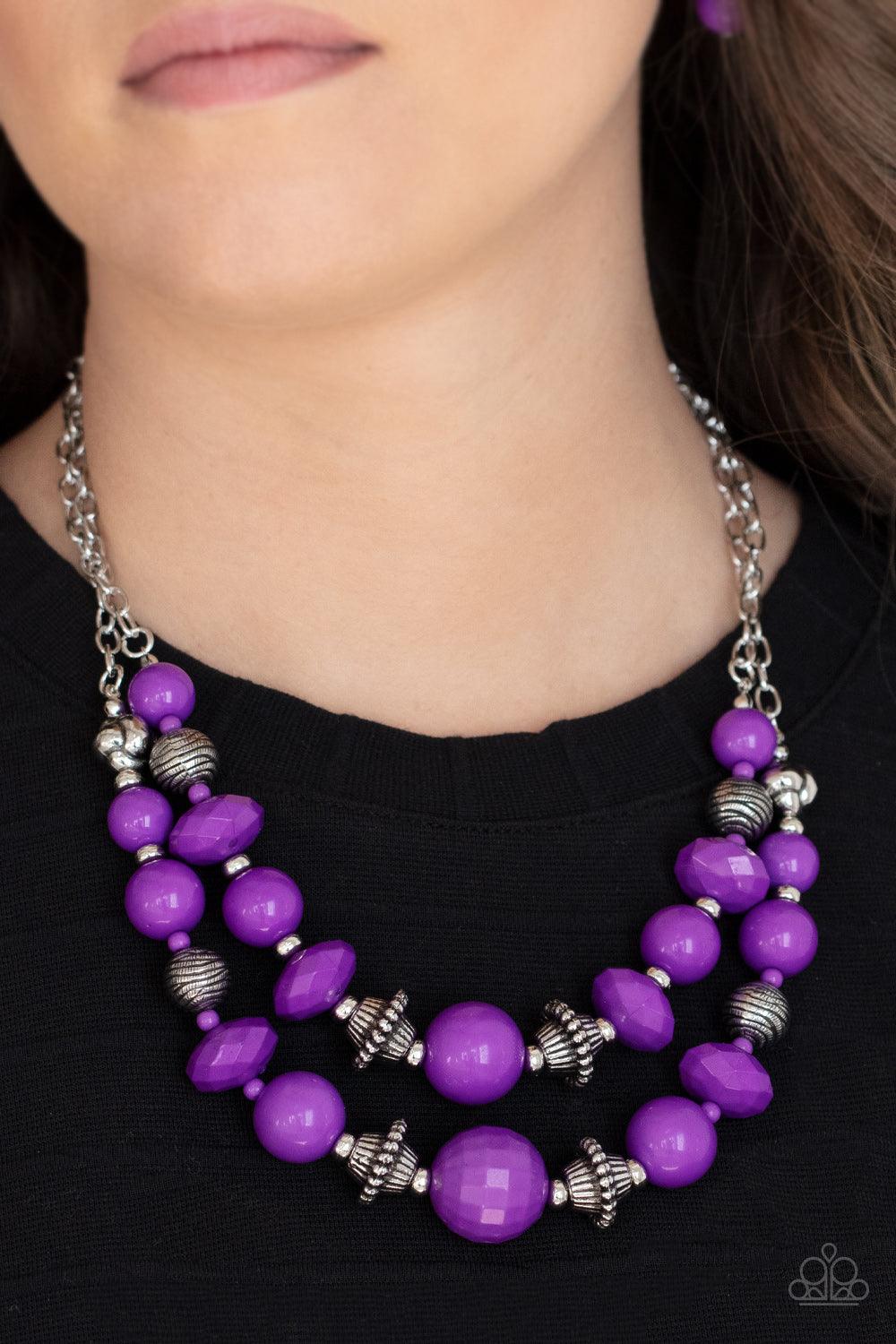 Paparazzi Accessories Upscale Chic - Purple Bold yet whimsical, Amethyst Orchid beads alternate with silver beads etched in a linear pattern along two strands for a vibrant statement below the collar. Features an adjustable clasp closure. Sold as one indi
