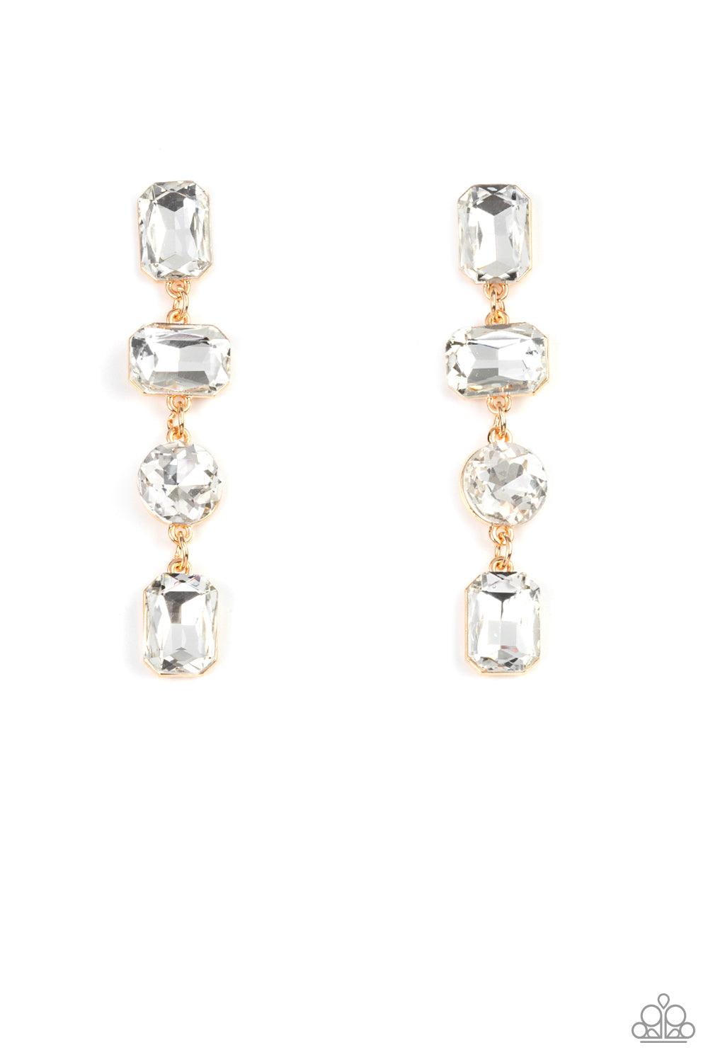 Paparazzi Accessories Cosmic Heiress - Gold A strand of oversized round, teardrop, and emerald cut white rhinestones trickles from the ear, creating a jaw-dropping golden chandelier. Earring attaches to a standard post earring. Sold as one pair of post ea