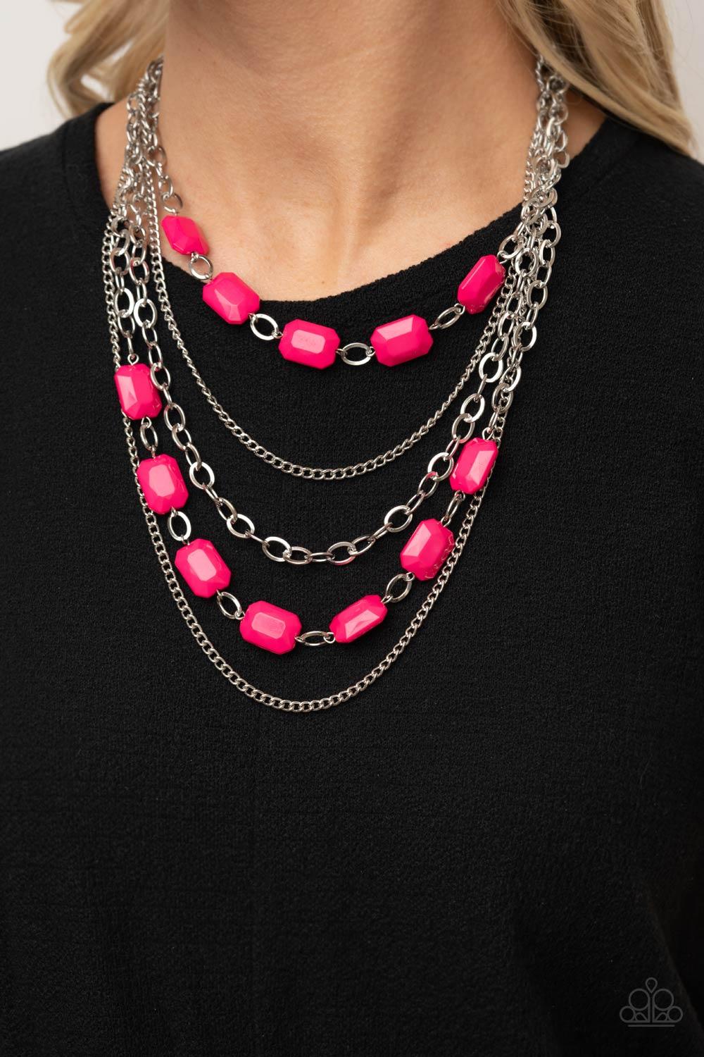 Paparazzi Accessories Standout Strands - Pink A stunning collection of silver chains and shiny rectangular Raspberry Sorbet beads falls in layers across the chest for a glamorous standout statement. Features an adjustable clasp closure. Sold as one indivi