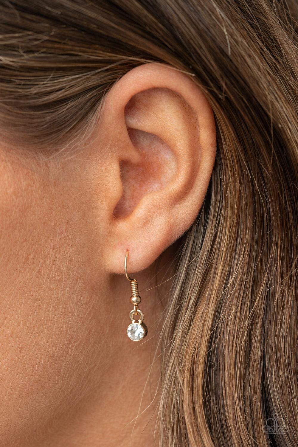 Paparazzi Accessories Forever Your Mom - Gold A bright gold infinity symbol features the word "Mother" in filigree script across the bottom. A row of sparkly dainty rhinestones travels across the curve creating a lovingly charming sentiment as it connects