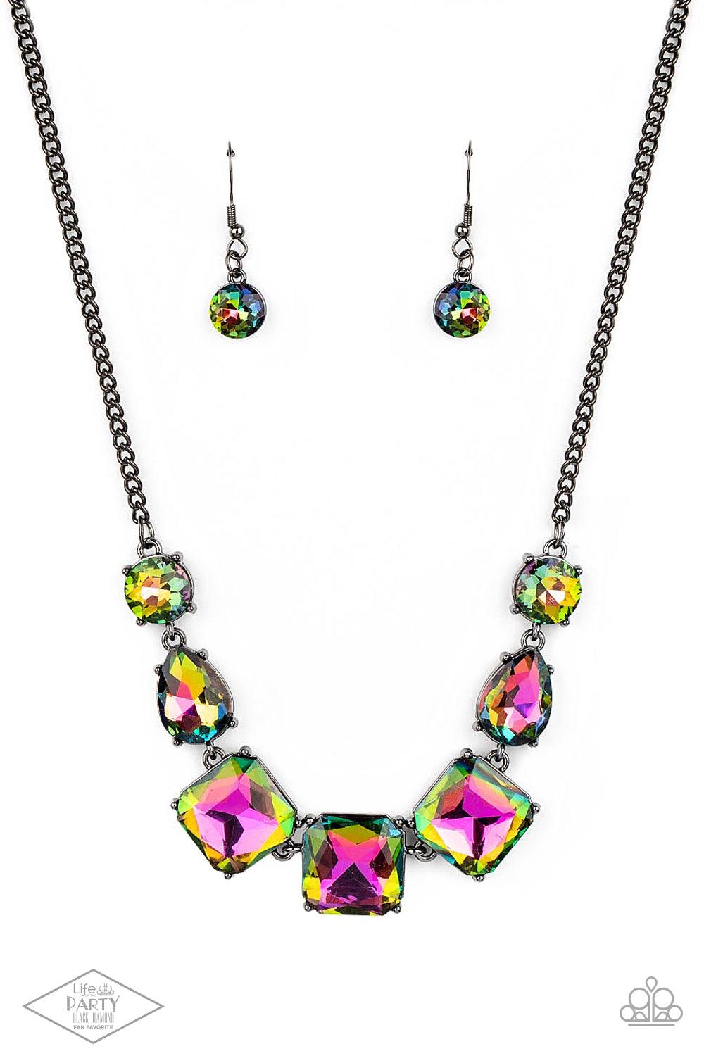Paparazzi Accessories Unfiltered Confidence - Multi A trio of brilliant oil spill square gut gems encased in classic gunmetal fittings takes center stage. Teardrop and round oil spill gems link to a gunmetal chain on either side of the trio for a striking