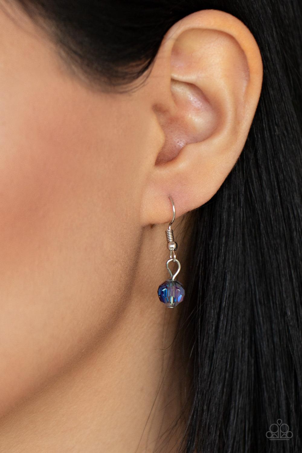 Paparazzi Accessories Mega Modern - Multi Flecked in oil spill iridescent, a smoky teardrop swings from the bottom of a chunky silver chain that attaches to a shimmery silver popcorn chain, creating a modern display below the collar. Features an adjustabl