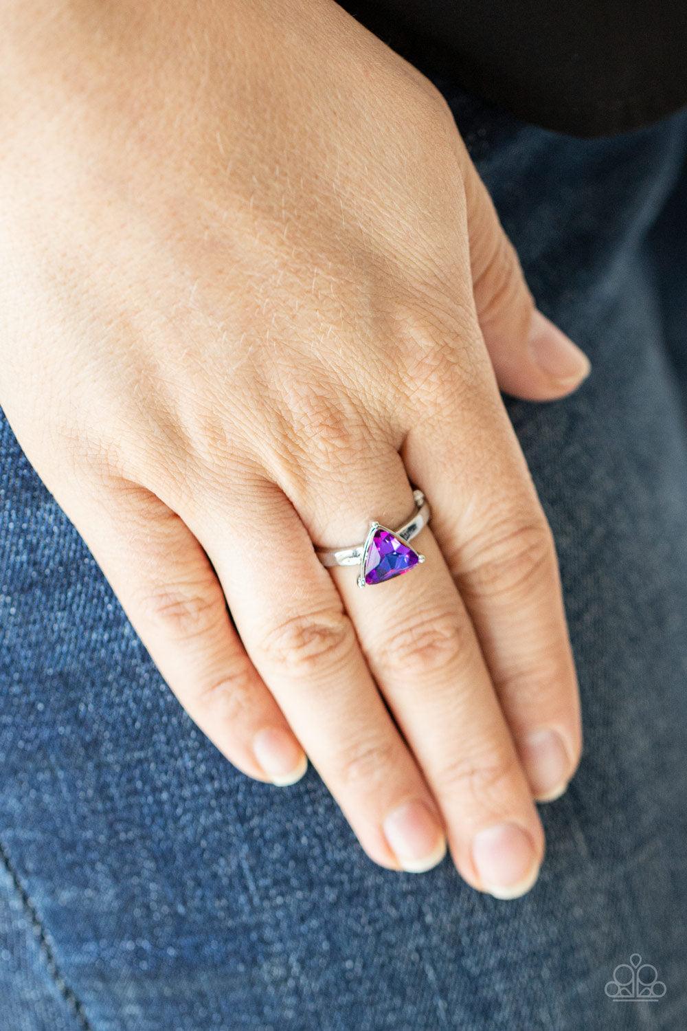 Paparazzi Accessories Tenacious Twinkle - Multi Featuring a UV shimmer, a triangular cut rhinestone is nestled inside of a pronged silver frame atop a classic silver band for a dash of dramatic dazzle. Features a stretchy band for a flexible fit. Sold as