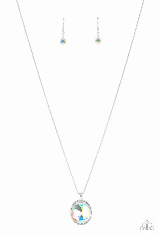 Paparazzi Accessories Instant Icon - Multi An oversized iridescent gem is pressed into the center of a sleek silver fitting, creating a mesmerizing statement piece at the bottom of a sleek silver chain. Features an adjustable clasp closure. Sold as one in