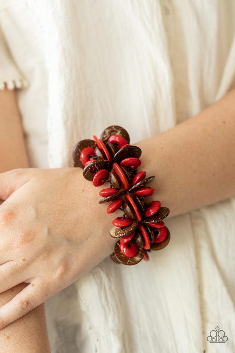 Paparazzi Accessories Caribbean Canopy - Red A collection of red and brown disc-shaped wooden beads are threaded along stretchy bands creating a tropical island vibe around the wrist. Sold as one individual bracelet. Bracelets