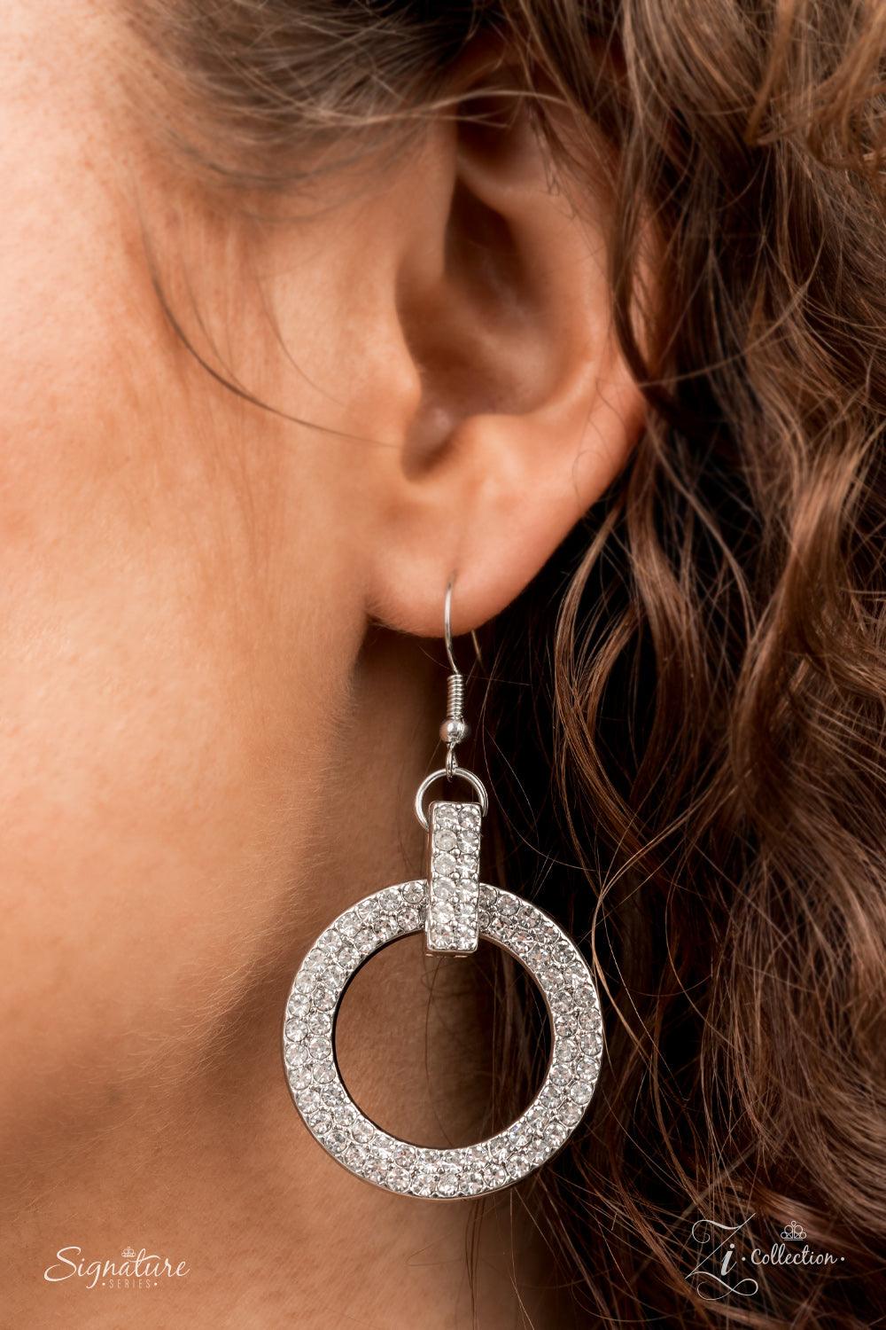 Paparazzi Accessories The Missy Elegantly enhanced with white rhinestone encrusted links, an effervescent array of white rhinestone encrusted silver hoops glamorously alternate below the collar for an unapologetically audacious sparkle. Features an adjust