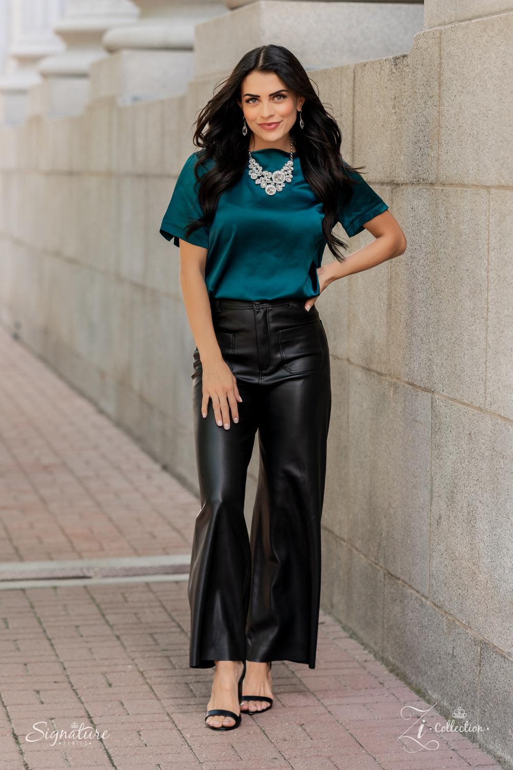 Paparazzi Accessories The Danielle Featuring an oversized collection of round, oval, and teardrop white rhinestones, an exaggerated explosion of dynamite dazzle coalesces into three separate frames below the collar. The combustible frames flawlessly link