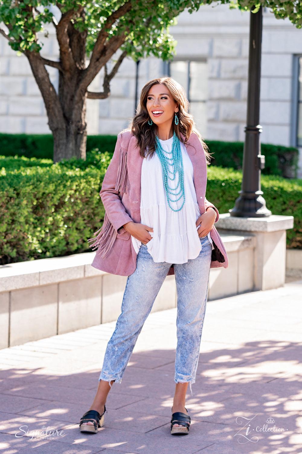 Paparazzi Accessories The Hilary Intermixed with dainty silver beads, a groundbreaking display of refreshing turquoise stone beads gradually increases in size as they drape into artisan inspired layers down the chest. The trailblazing length combined with
