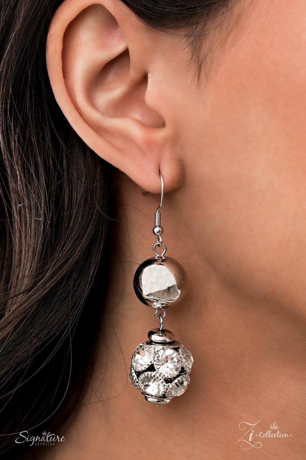 Paparazzi Accessories The Liberty Held together by rectangular silver frames, a couture-clutching collection of oversized silver beads interspersed with white rhinestone encrusted ornaments alternates with interlocking rows of white rhinestone encrusted c