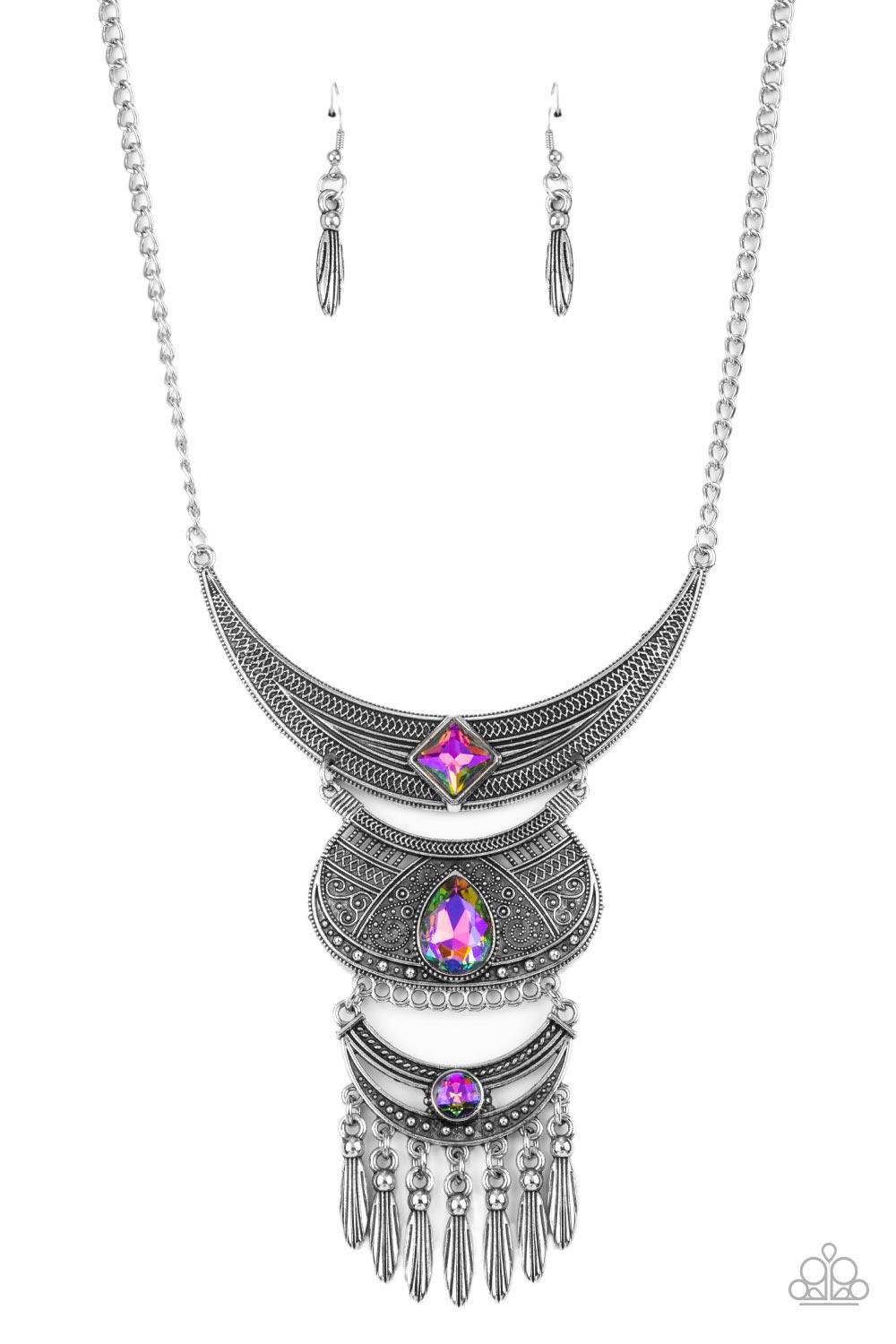 Paparazzi Accessories Lunar Enchantment - Multi Embossed in studded, geometric, and paisley filigree-like patterns, three mismatched silver half moon plates dramatically link below the collar. Featuring an iridescent UV shimmer, an oversized collection of