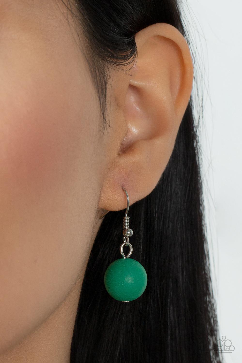 Paparazzi Accessories Vivid Vanity - Green Gradually increasing in size, two oversized rows of silver and Leprechaun beads layer into two bubbly layers below the collar. Features an adjustable clasp closure. Sold as one individual necklace. Includes one p