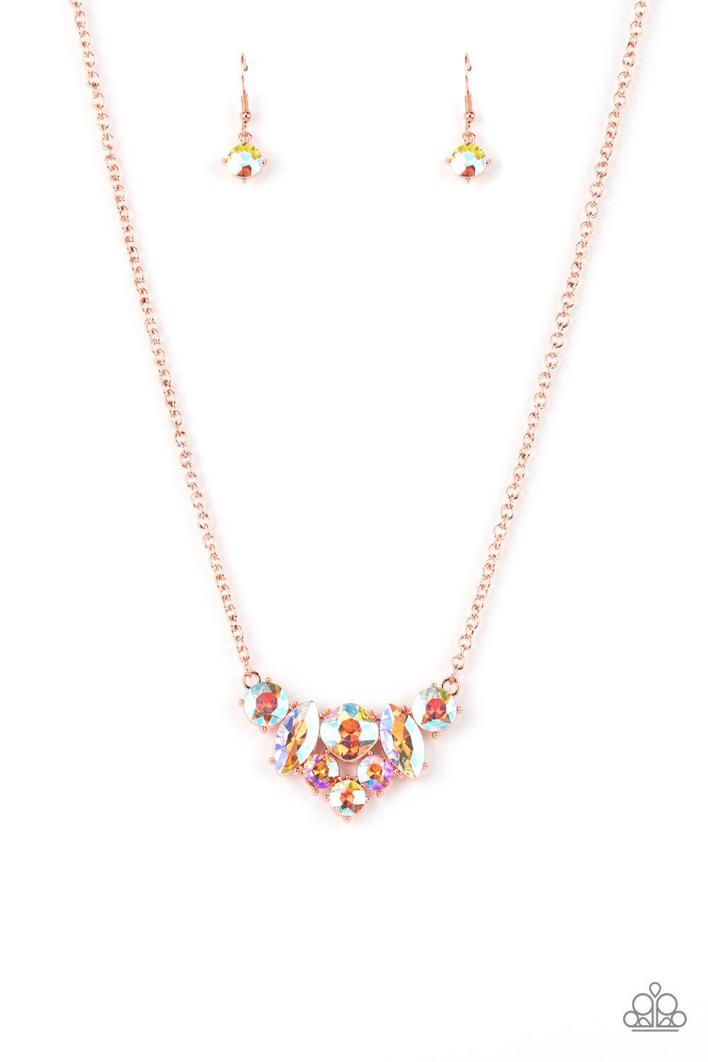 Paparazzi Accessories Lavishly Loaded - Copper A glittering collection of marquise and round peach-colored gems encased in studded copper fittings, coalesce into a lavish frame that gives way to a classic shiny copper chain resulting in a glamorous finish
