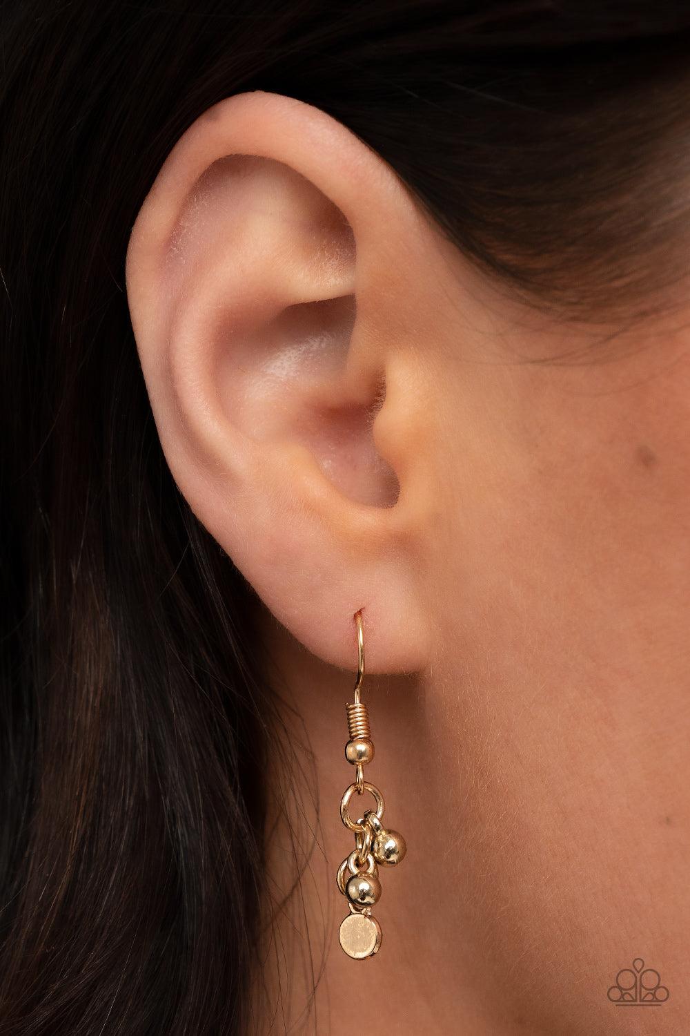 Paparazzi Accessories Sassy Super Nova - Gold Dainty clusters of gold beads and gold discs connect with iridescent gold gems below the collar, resulting in a stellar fringe. Features an adjustable clasp closure. Sold as one individual necklace. Includes o