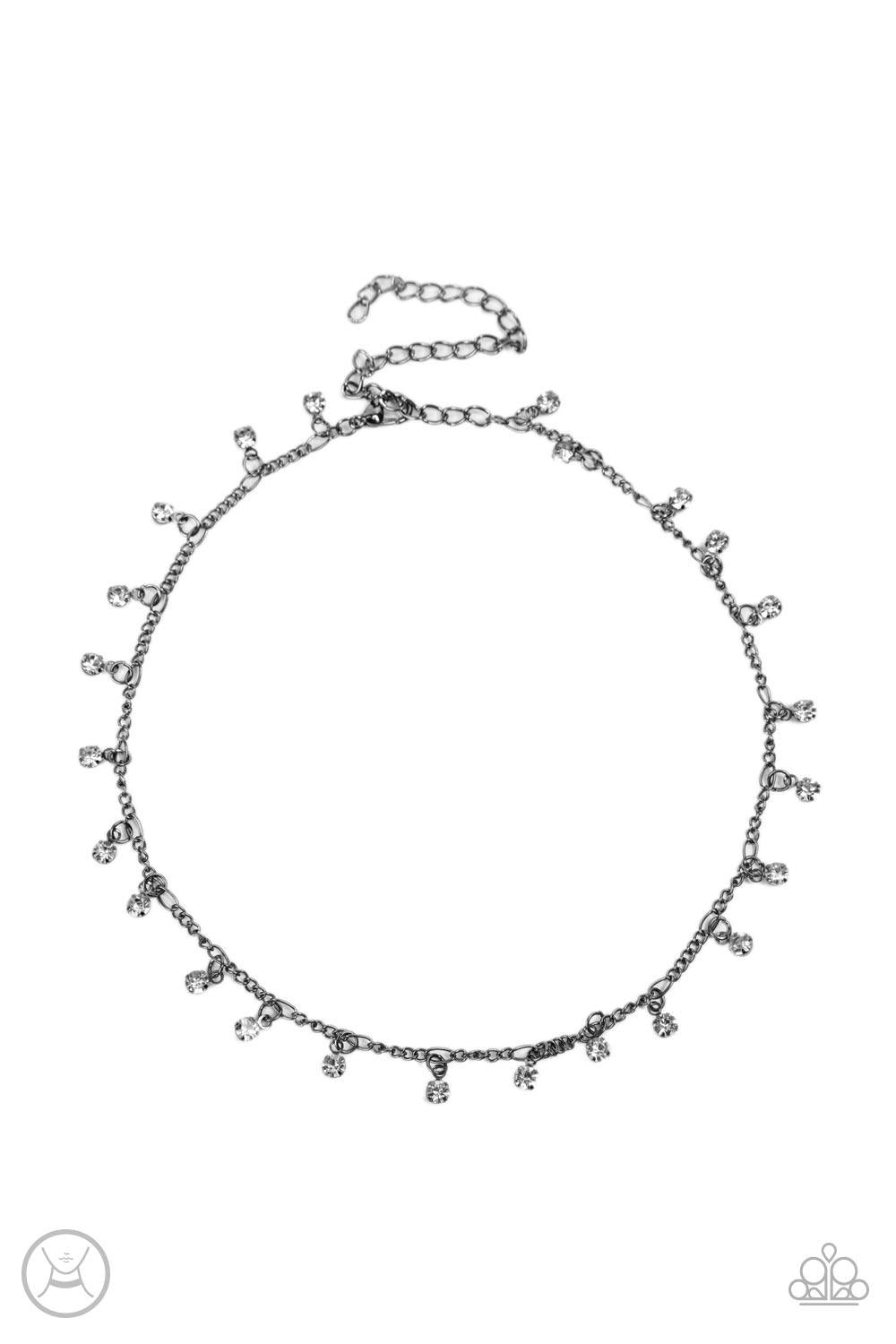 Paparazzi Accessories Bringing SPARKLE Back - Black Encased in gritty gunmetal fittings, glassy white rhinestones dance from the bottom of a dainty gunmetal chain for a dash of spell-binding radiance around the neck. Sold as one individual choker necklace