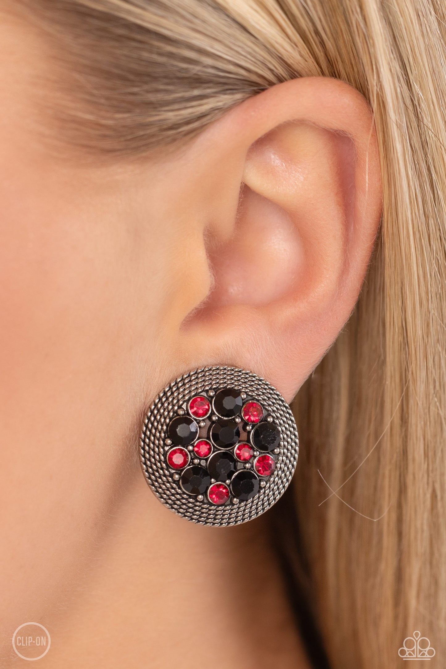 Paparazzi Accessories Stellar Status - Multi A glitzy collection of red and black rhinestones are encircled with a silver rope-like border, resulting in a smoldering centerpiece. Earring attaches to a standard clip-on fitting. Sold as one pair of clip-on