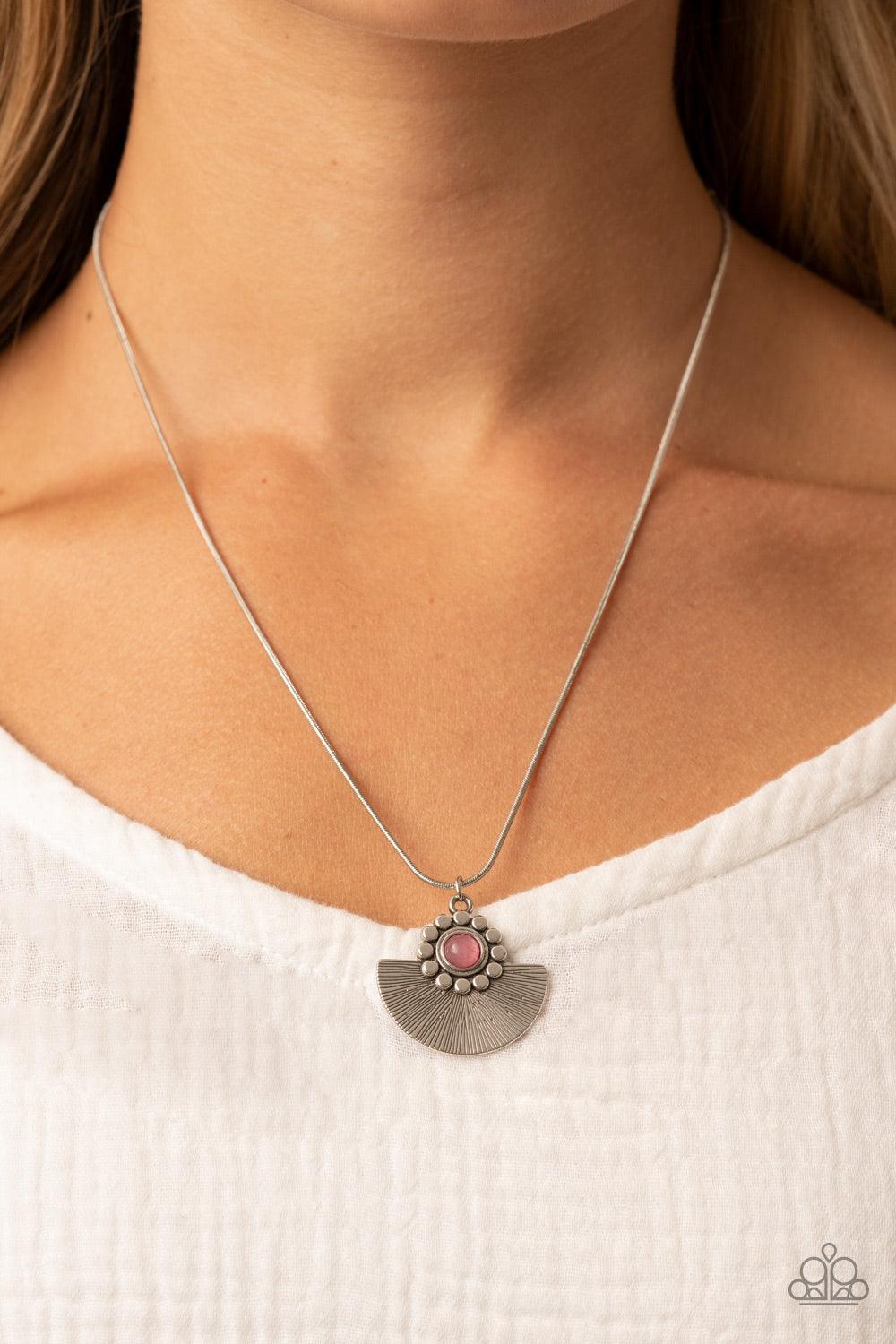 Paparazzi Accessories Magnificent Manifestation - Pink Bordered in a ring of flat silver studs, a mystical pink bead adorns the top of a textured silver half moon pendant that glides along a rounded silver snake chain for an ethereal fashion. Features an