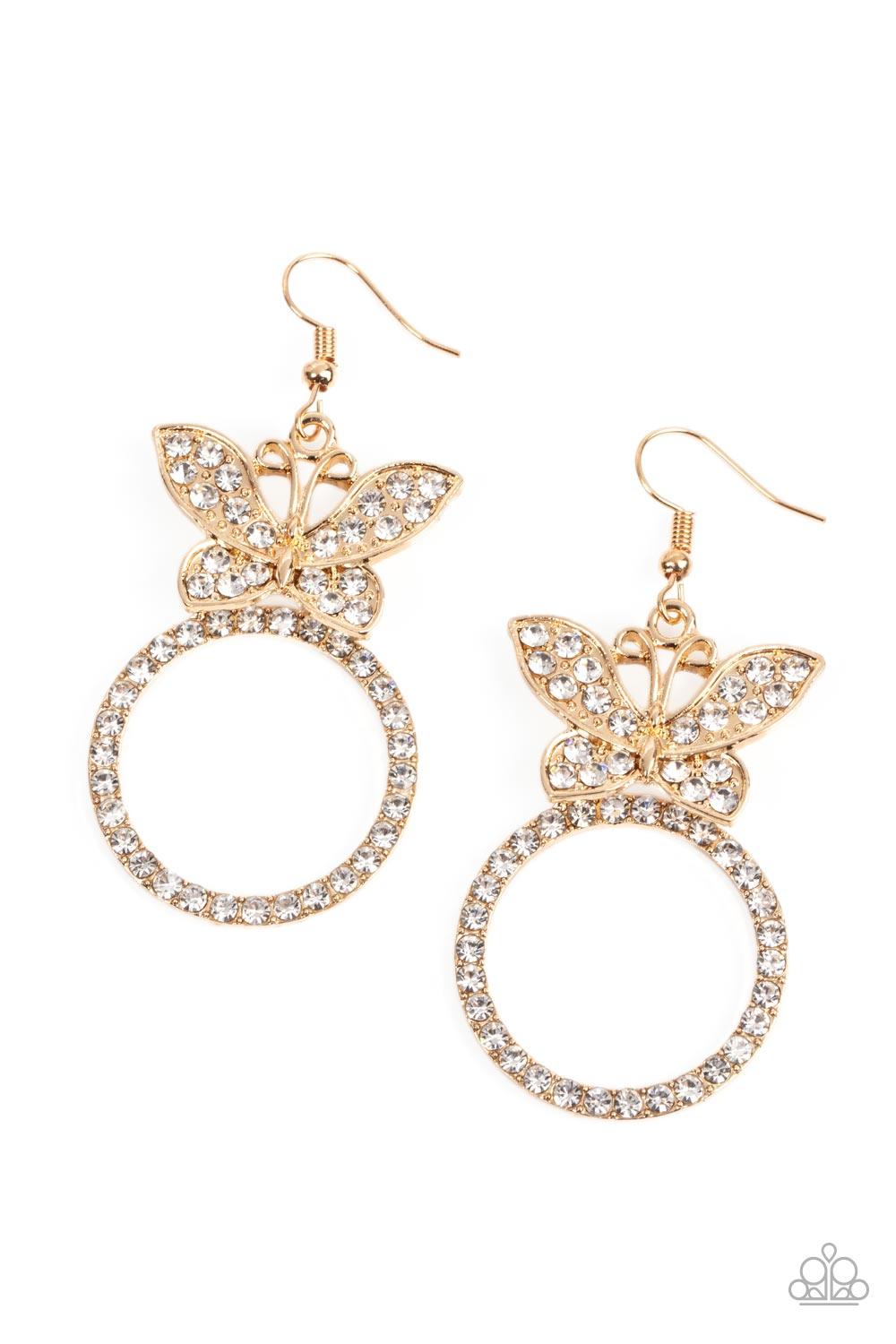 Paparazzi Accessories Paradise Found - Gold A white rhinestone encrusted gold butterfly flutters atop a gold ring dotted in matching white rhinestones, resulting in a dazzling statement piece. Earring attaches to a standard fishhook fitting. Sold as one p
