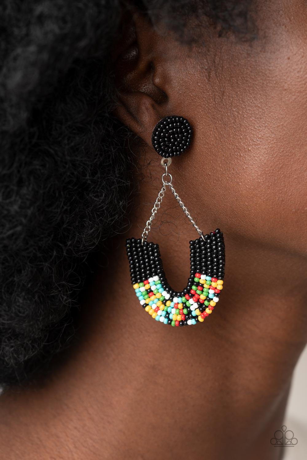 Paparazzi Accessories Make it RAINBOW - Black Adorned in sections of black and multicolored seed beaded accents, a colorful rainbow swings from the bottom of shimmery silver chains that attach to a black seed beaded disc for a bohemian inspired fashion. E