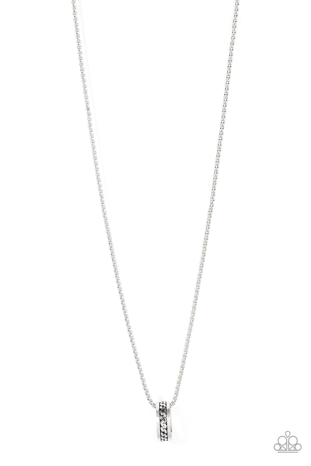 Paparazzi Accessories Emotion Potion - Silver Embossed in a band of zigzagging texture, an antiqued silver ring glides along a strand of silver box chain across the chest in a rustic fashion. Features an adjustable clasp closure. Sold as one individual ne