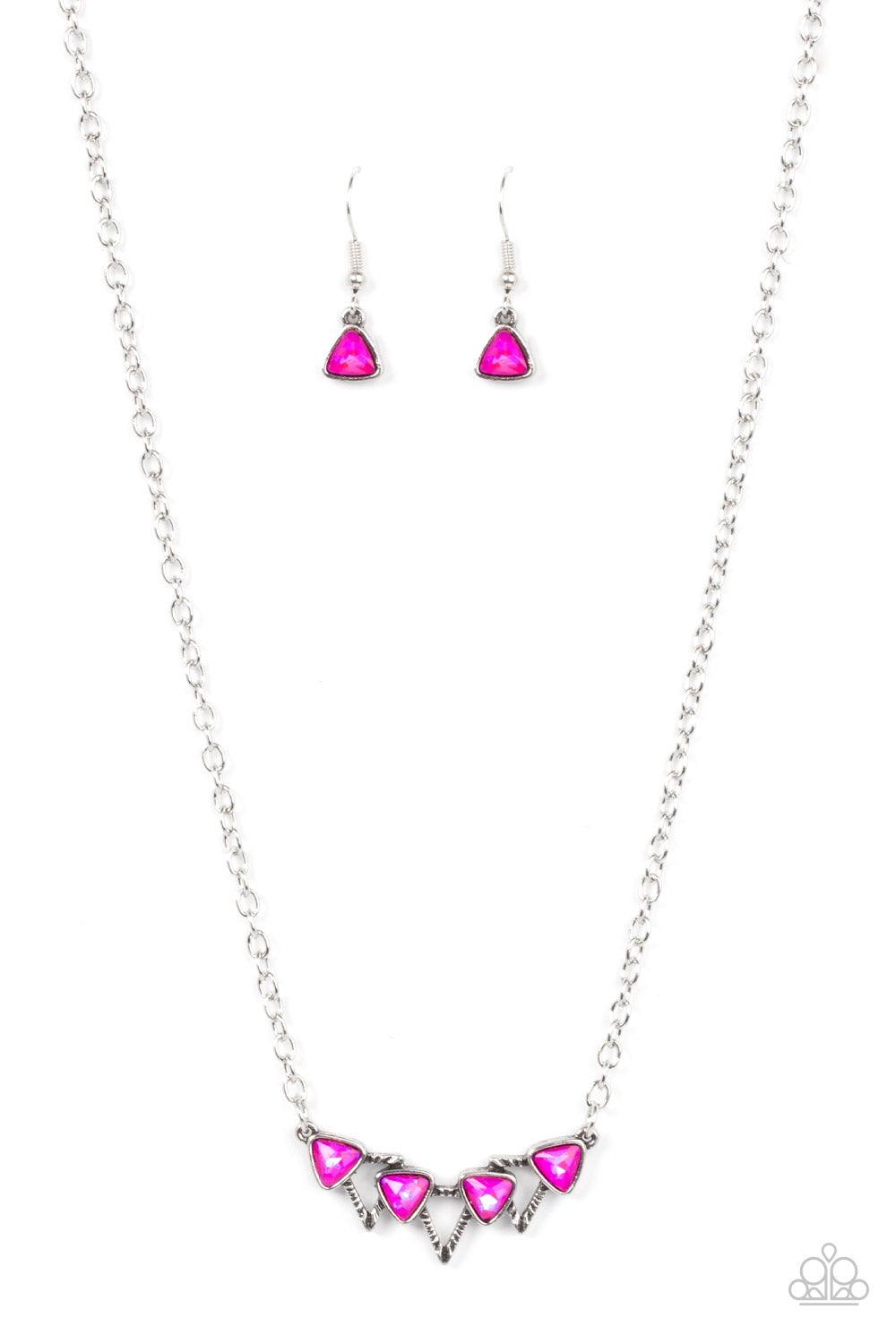 Paparazzi Accessories Pyramid Prowl - Pink A staggered row of iridescent pink triangular gems stack across the front of a row of textured silver triangular frames, resulting in a stellar sparkle below the collar. Features an adjustable clasp closure. Sold