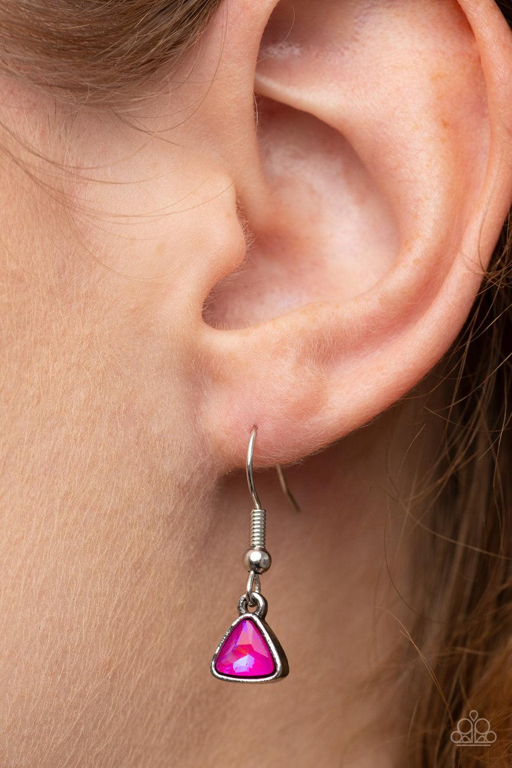Paparazzi Accessories Pyramid Prowl - Pink A staggered row of iridescent pink triangular gems stack across the front of a row of textured silver triangular frames, resulting in a stellar sparkle below the collar. Features an adjustable clasp closure. Sold