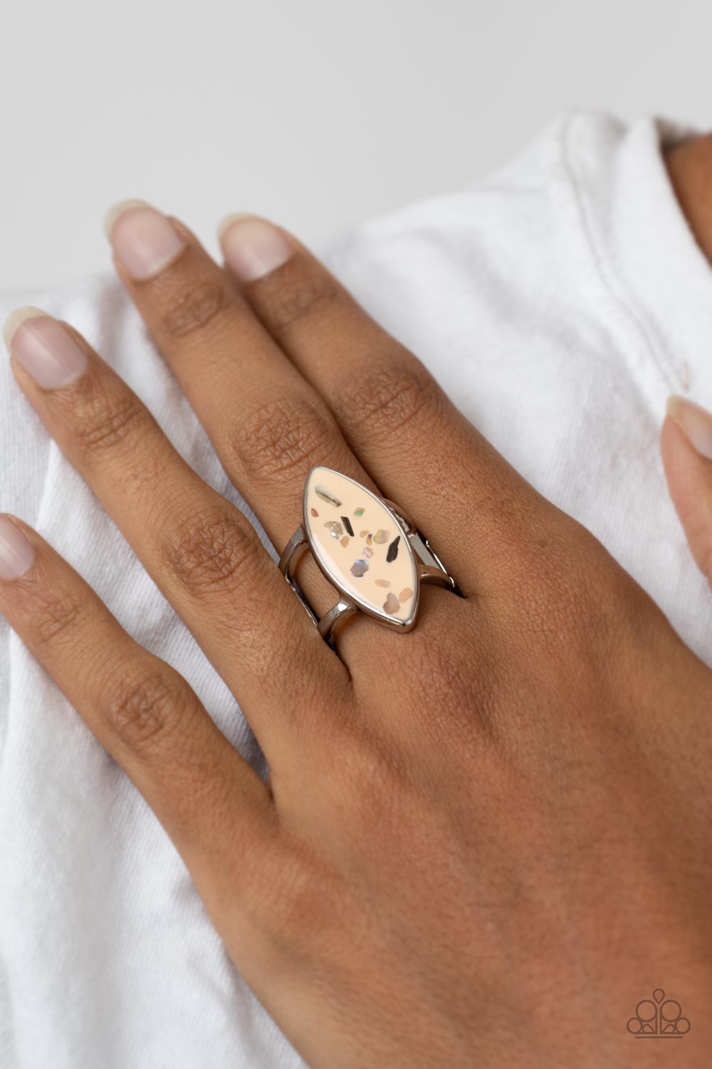 Paparazzi Accessories Oceanic Odyssey - Brown Iridescent shell-like flecks are sprinkled across a brown backdrop inside a glassy marquise shaped frame, resulting in a playful splash of color atop layered silver bands. Features a stretchy band for a flexib