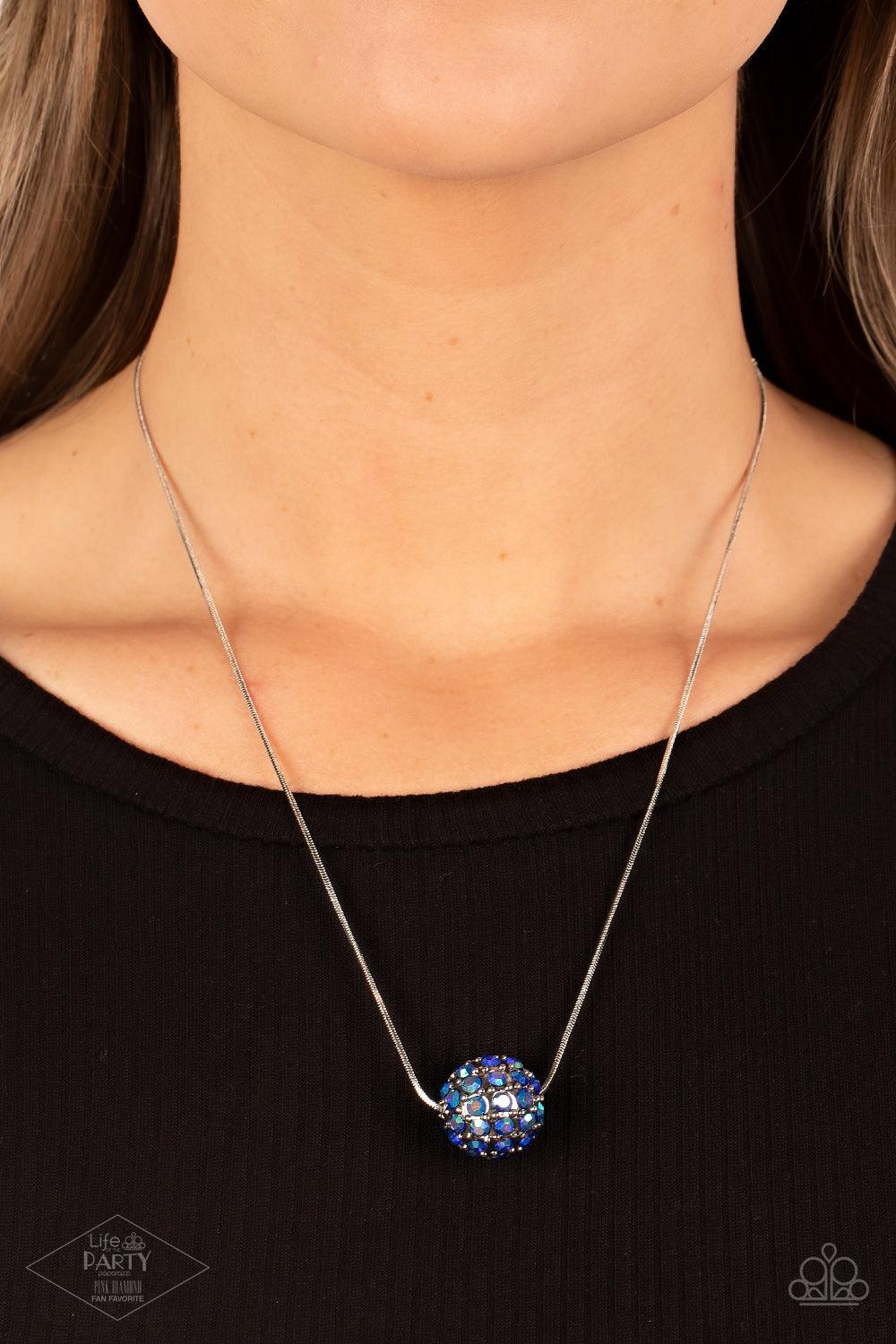 Paparazzi Accessories Come Out of Your BOMBSHELL - Multi Bedazzled in stellar iridescent rhinestones, a dramatic silver bead slides along a sleek silver chain below the collar for a statement-making look. Due to its prismatic palette, color may vary. Feat