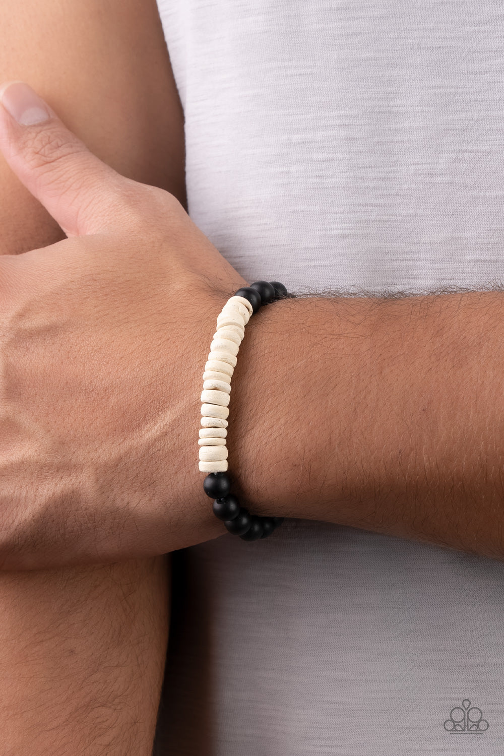 Paparazzi Accessories Recreational Remedy - White White wooden discs and smooth black stone beads are threaded along stretchy bands around the wrist, resulting in an earthy combo. Sold as one individual bracelet. Bracelets